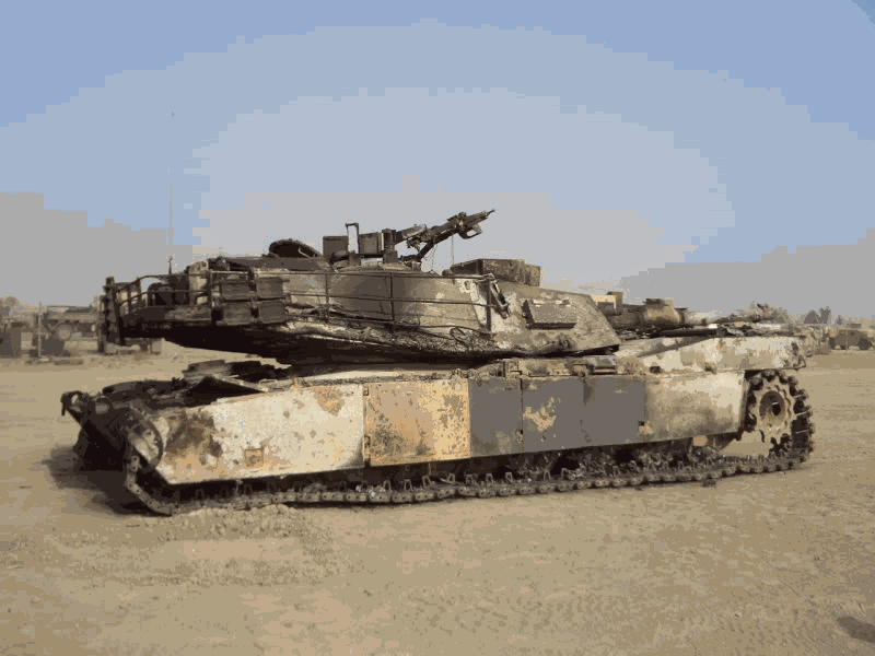 Crewmembers Refueling an M1 Abrams Tank Photograph by Arthur