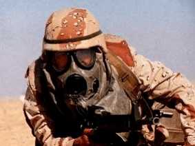 This marine isn't doing so great with his MOPP gear. He has no CPOG. No gloves, probably no overboots. No rubber helmet cover. Its half-hearted training and readiness that kills and gets our men sick