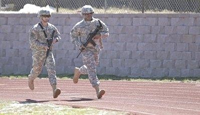 running in combat boots